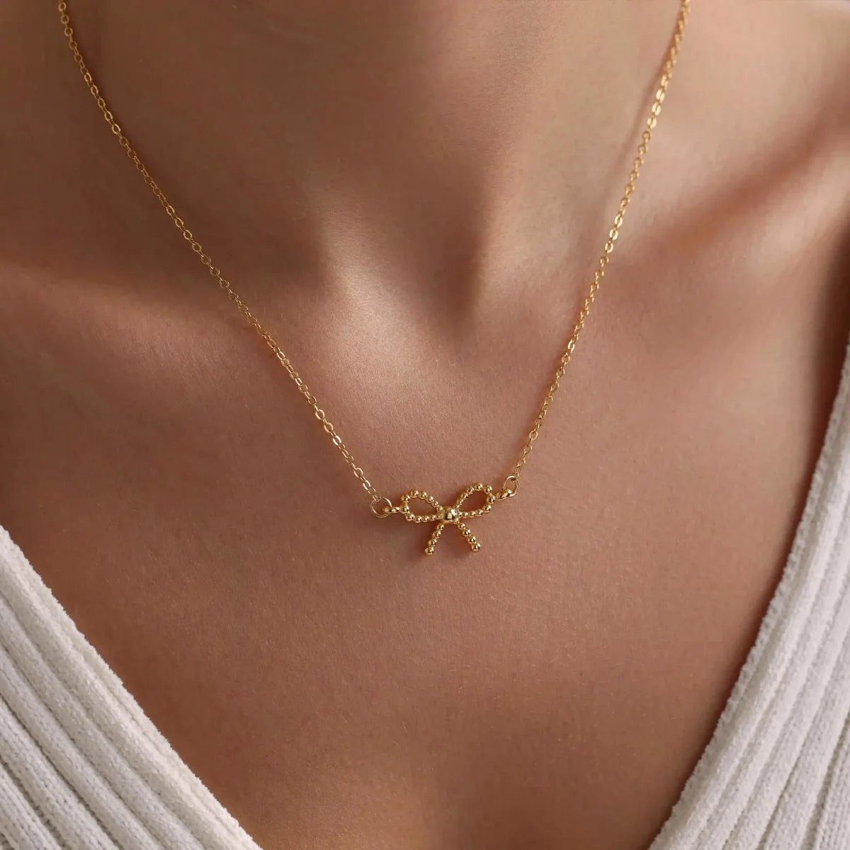 Yoosteel Dot bow necklace, Gold