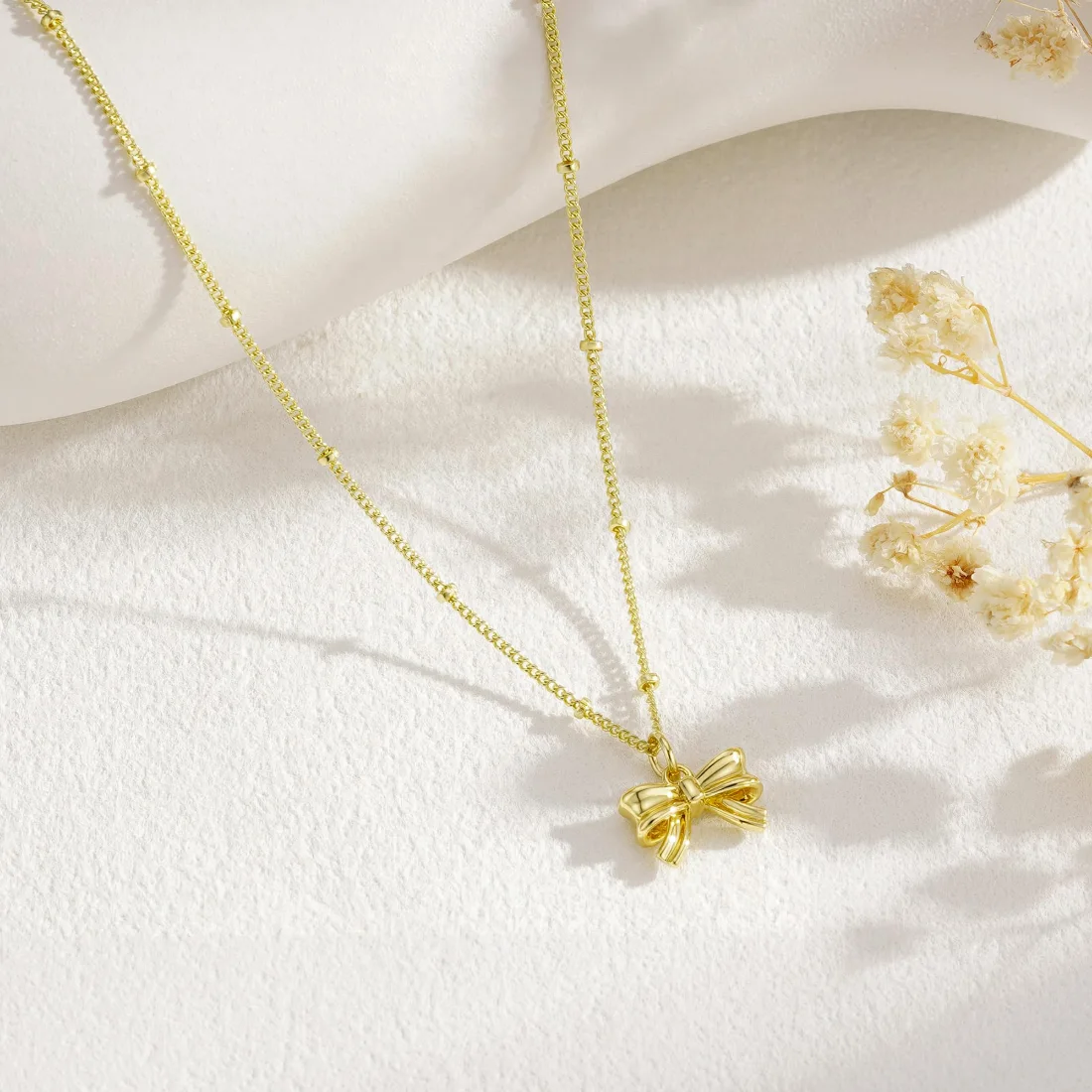 Yoosteel Wide bow necklace, Gold, view 4